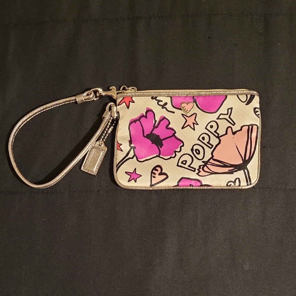 Coach Poppy Cream and White Dots Wristlet with Pink and Purple Floral Design